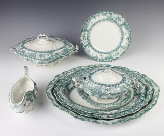 A Wedgwood Phoebe pattern part dinner service comprising 11 small plates (2 a/f), 12 medium plates (1 a/f), 11 dinner plates, 2 sauce tureens, lids and stands, sauce ladle, 2 sauce boats (1 a/f), 2 vegetable tureens and covers, 3 graduated meat plates 