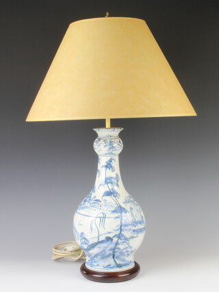 A Georgian design blue and white baluster table lamp decorated with figures in a European garden 38cm 