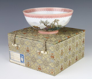 An 18th Century style Chinese deep bowl decorated with an extensive landscape scene with figures and boats 16cm, in a fitted case 