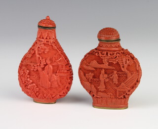 Two modern Cinnabar lacquer scent bottles decorated with figures in pavillion landscapes 6cm and 7cm 