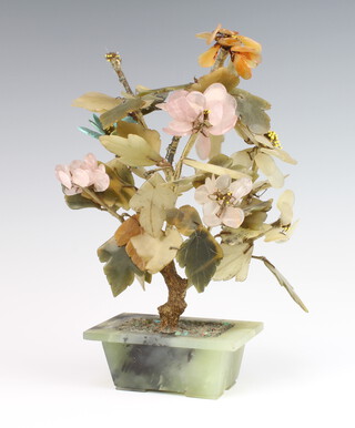 A Chinese soapstone flower group in a ditto jardiniere 30cm 