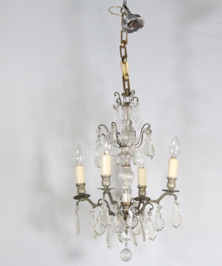A gilt metal and cut glass 4 light electrolier hung lozenges 56cm h x 35cm w, 