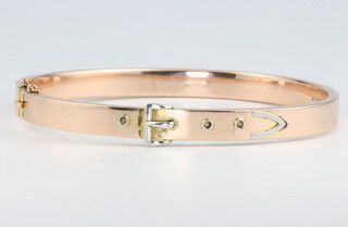 A 15ct yellow gold buckle bangle 9.9 grams 