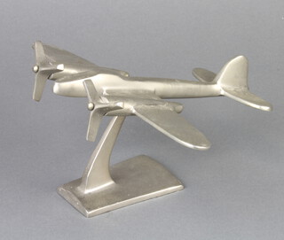 An Art Deco style chrome model of a twin engined aircraft 9cm x 18cm x 23cm 