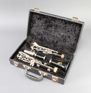 A Boosey and Hawkes clarinet "The Regent" cased 