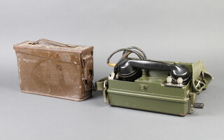 A field telephone set J together with a metal ammunition box 