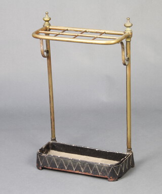 A Victorian gilt metal and iron 8 division stick/umbrella stand with gilt metal finials complete with drip tray 60cm h x 36cm w x 15cm d 