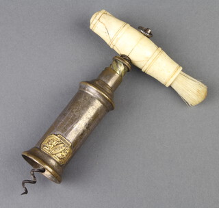 A Dowler patent corkscrew with ivory handle (cracking to handle)