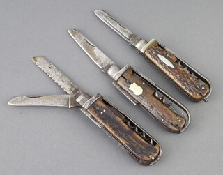 Three 19th Century horsemen style knives marked Buga comprising, horseman style knife with 2 blades, pick, corkscrew and toothpick blade marked Buca Icttenham Court Road with 9cm horn grip, a Suitali horseman style knife with 2 blades (1f), saw blade, bodkin, gimlet, corkscrew, pick, tweezers and toothpick with 9cm horn grip and 1 other with 2 blades (1f), bodkin, corkscrew (f), hoof pick, tweezers (toothpick missing) with 9cm horn grip 