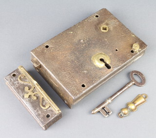 T Pugh & Co London, a 19th Century steel lock complete with key and brass escutcheon 12cm x 18cm x 4cm 