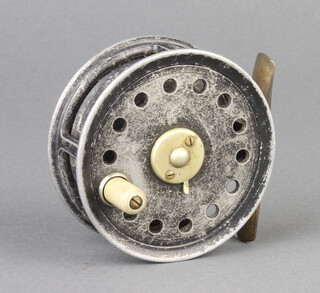 An Alcocks 3" trout fly fishing reel with 2 screw drum latch and stag trademark 
