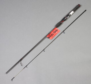 A Shakespeare Ugly Stik carbon fibre 2 piece 6' spinning fishing rod 