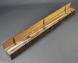 A Victorian pine travelling fishing case 15cm h x 175cm l x 15cm w, containing a collection of old fishing rods including a bamboo roach pole 
