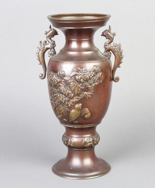 A 19th Century Japanese twin handled vase decorated grouse and flowers 26cm x 10cm 