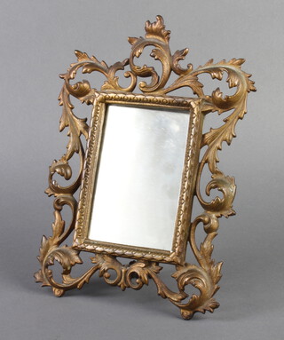 A Victorian pierced gilt metal rococo style easel frame fitted a mirror (slight chip to base) 28cm x 20cm 