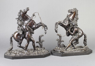 After Coustou, a pair of 19th Century bronze figures of Marley horses, raised on lozenge shaped black marble bases 28cm h x 26cm w x 12cm d 