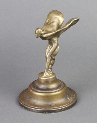 A Rolls Royce Spirit of Ecstasy nickel? car mascot for the 20HP model, the base marked 'Rolls Royce Ltd. Feb 6th 1911' and signed 'C Sykes', the underwings marked 'Trade Mark Reg' and 'Reg US Pat Off'. 10.2 cm high (not including nut) 
