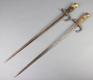 Two French chassepot bayonets, blades slightly rusted 