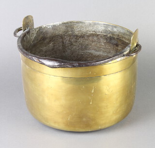 A 19th Century brass preserving pan with steel swing handle 18cm x 28cm 