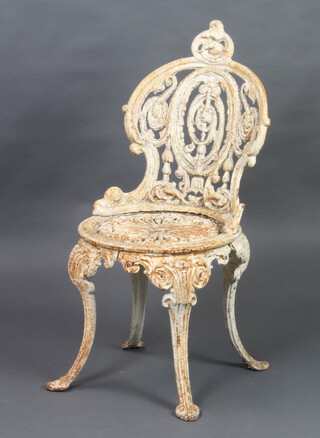A white painted Colebrookdale style garden chair raised on cabriole supports 