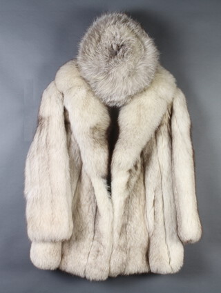 A lady's white quarter length fur coat together with matching hat 
