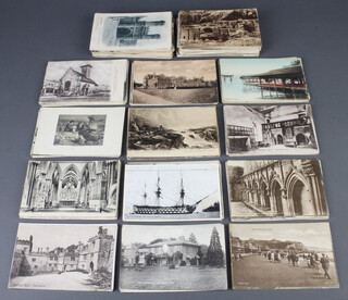A quantity of black and white postcards