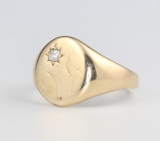A gentleman's 9ct yellow gold diamond signet ring 9 grams, size V 