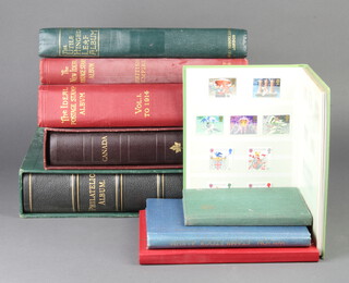 A Stanley Gibbons red stock book of Elizabeth II mint GB stamps together with a ditto green, 2 stock books of world stamps and 5 empty albums