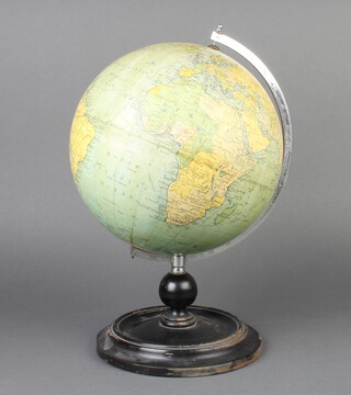 A Philips 9" terrestrial globe raised on an ebonised base