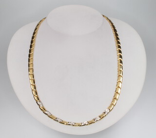 An 18ct yellow gold diamond set necklace, 43cm, 34.4 grams  