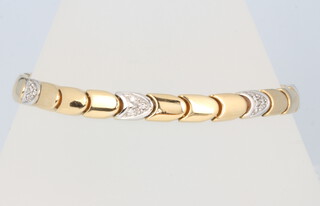 An 18ct yellow gold diamond set bracelet 19cm, 18.1 grams 