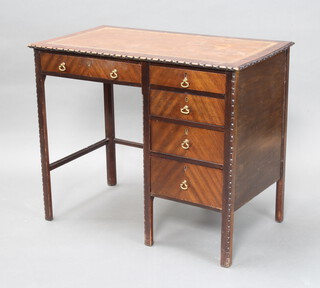 A 1930's Chippendale style mahogany desk fitted inset writing surface and 4 drawers, raised on square tapered supports 76cm h x 91cm w x 53cm d 