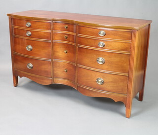 An American Philadelphia style mahogany serpentine fronted mahogany sideboard/chest of drawers, fitted central drawers flanked by drawers with oval drop handles, raised on bracket feet 87cm h x 138cm w x 51cm d  