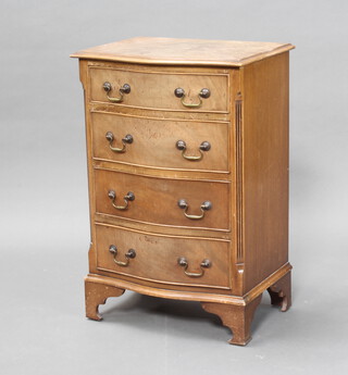 A Georgian style bleached mahogany serpentine fronted chest of 4 long drawers, raised on bracket feet 74cm h x 49cm w x 37cm d (some sun bleaching and water damage to the top)
