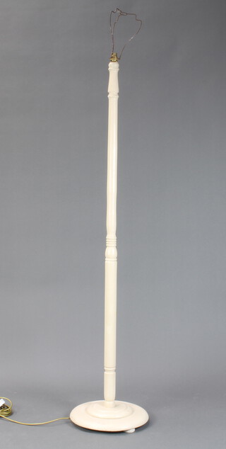 A turned white painted standard lamp 148cm h x 35cm diam. 