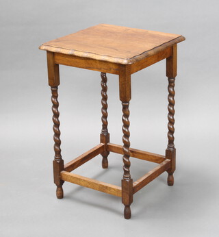 A 1930's square oak occasional table with pie crust edge, raised on spiral turned supports 72cm h x 46cm x 46cm 