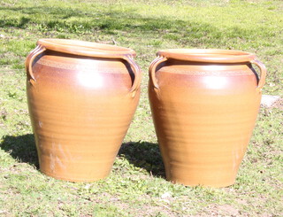 Errington, Ray & Co, a pair of 3 handled terracotta plant pots 61cm h x 44cm diam. 

