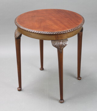 An Edwardian Chippendale style circular mahogany occasional table raised on club supports 72cm h x 64cm diam. 