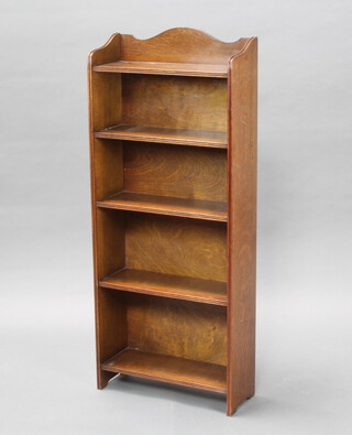 A 1930's oak 5 tier bookcase 103cm h x 45cm w x 18cm d 