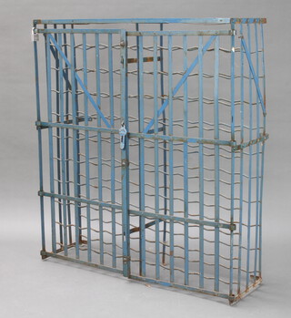 A Ridex metal 100 bottle wine rack enclosed by grilled doors 113cm h x 100cm w x 37cm d 