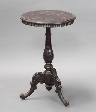 A Victorian style circular carved mahogany wine table on pillar and tripod base 73cm h x 45cm diam. 