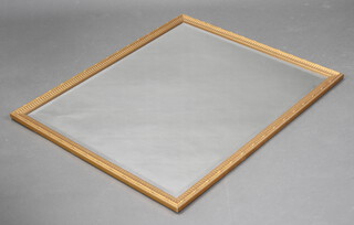 A square bevelled plate wall mirror contained in a decorative gilt frame 99cm h x 83cm w 