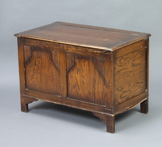 An oak coffer with linenfold decoration 52cm h x 75cm w x 45cm d 
