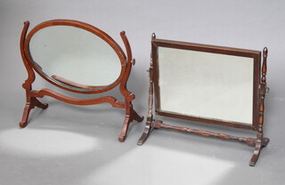 A Georgian style rectangular plate dressing table mirror contained in a mahogany swing frame 42cm h x 47cm w x 21cm d (some sun bleaching, section of veneer missing to the left hand side) together with a Georgian style oval plate dressing table mirror in a mahogany swing frame 44cm h x 48cm w x 22cm d (missing brass fitment to side)