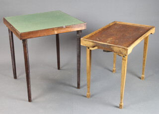 A square beech framed folding bridge table with green baize top 68cm h x 60cm w x 60cm d (moth damage) together with a folding tray table 59cm h x 68cm w x 44cm d (ring marks, sun bleaching and water marks) 
