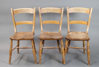 A set of 3 19th Century elm and beech Windsor bar back dining chairs 