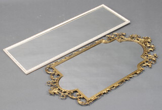 A shaped plate mirror contained in an Italian style pierced gilt frame 90cm x 46cm   together with a rectangular plate mirror in a white and gilt frame 95cm x 33cm 