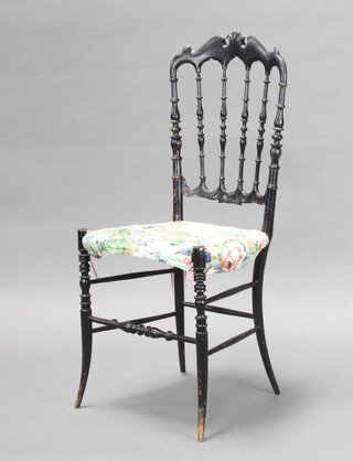 A Victorian ebonised rout chair (some wear to the ebonising) 