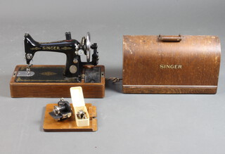 A Singer sewing machine complete with key No. Y852931 