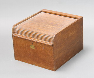 Dunkin & Co. Ltd, a rectangular oak table top filing chest with tambour shutter 31cm h x 48cm w x 44cm d (some scuffing) 